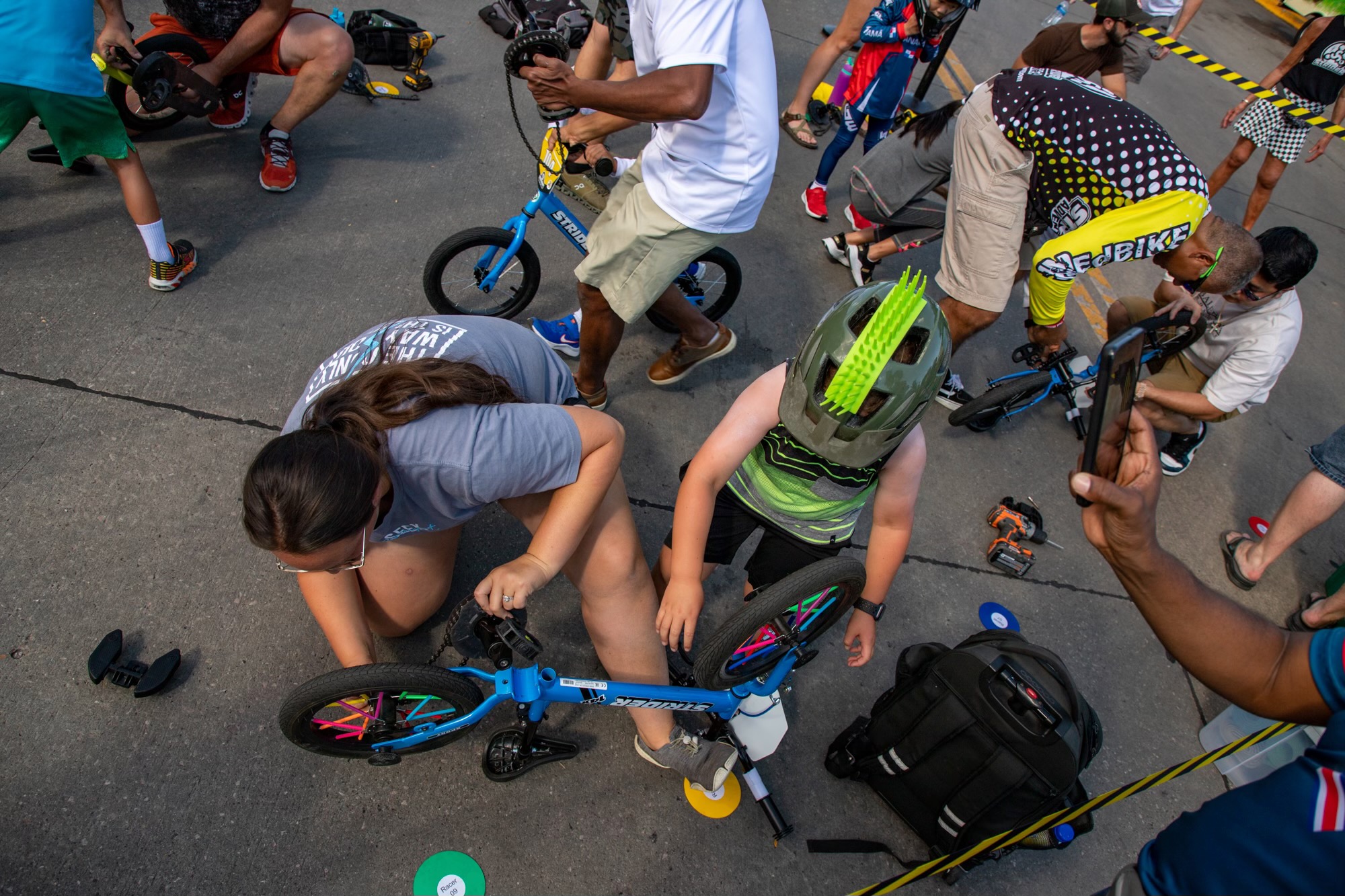 Pitstop putting pedals on the bike