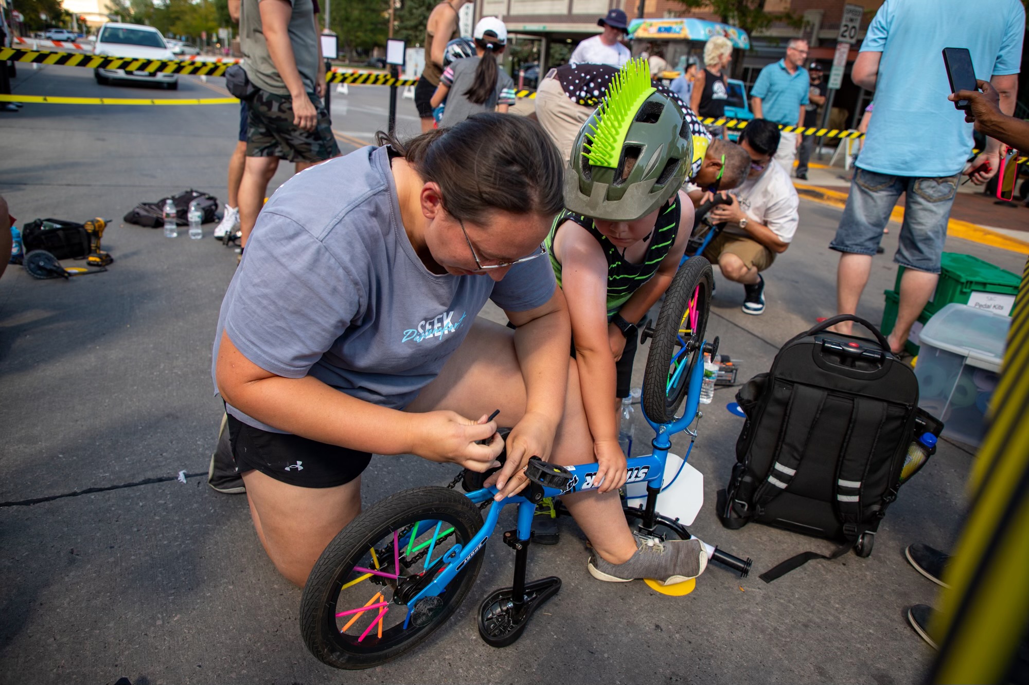 Pitstop putting pedals on the bike